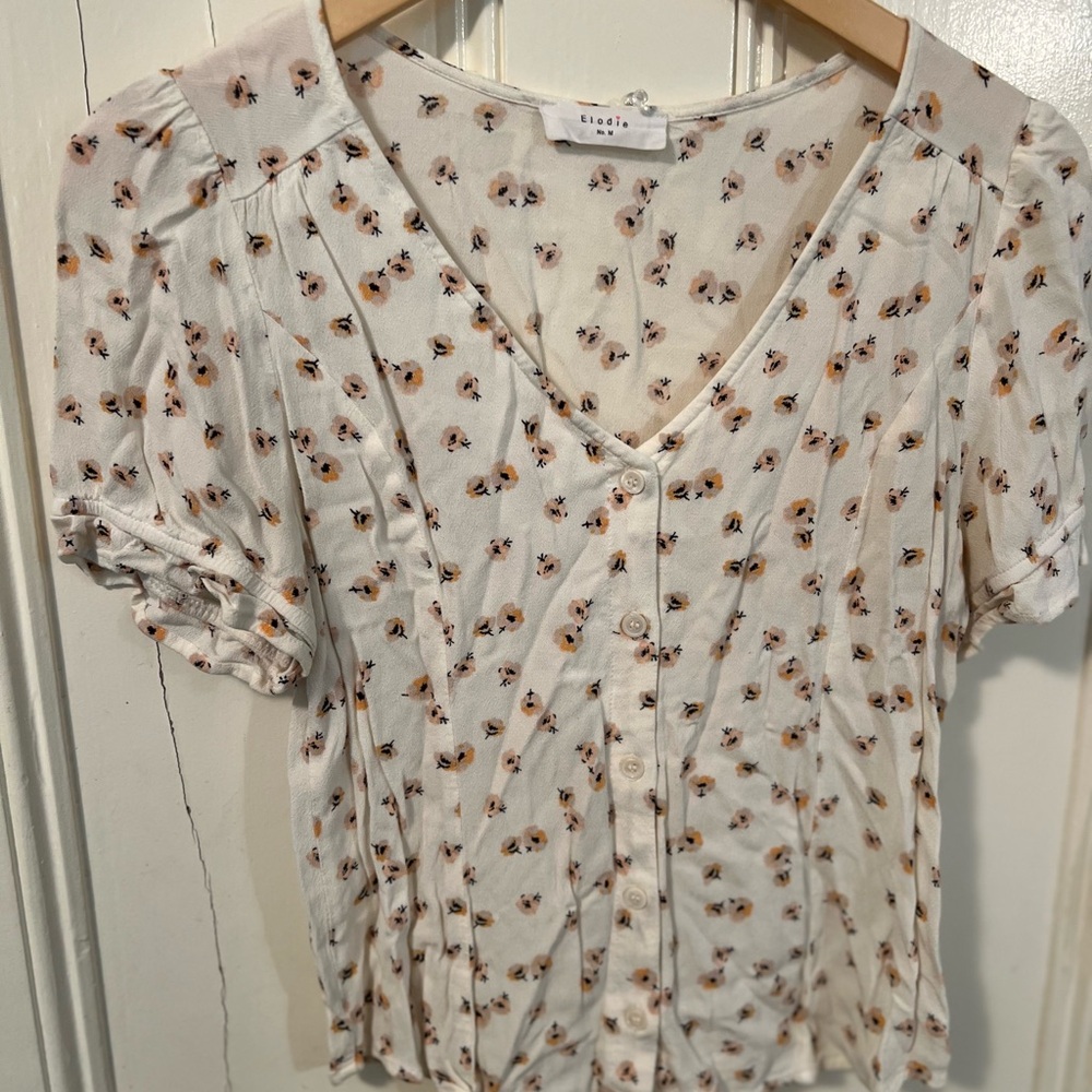 Cute floral white top with button down front